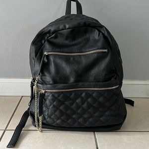 Standard sized leather backpack